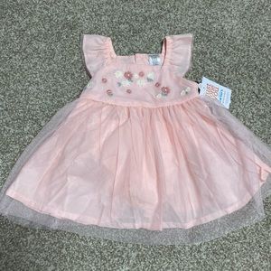 Pink beautiful dress by Carter’s.